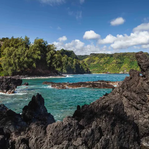 Lava Rocks Peninsula Keanae tropical lush landscape Maui