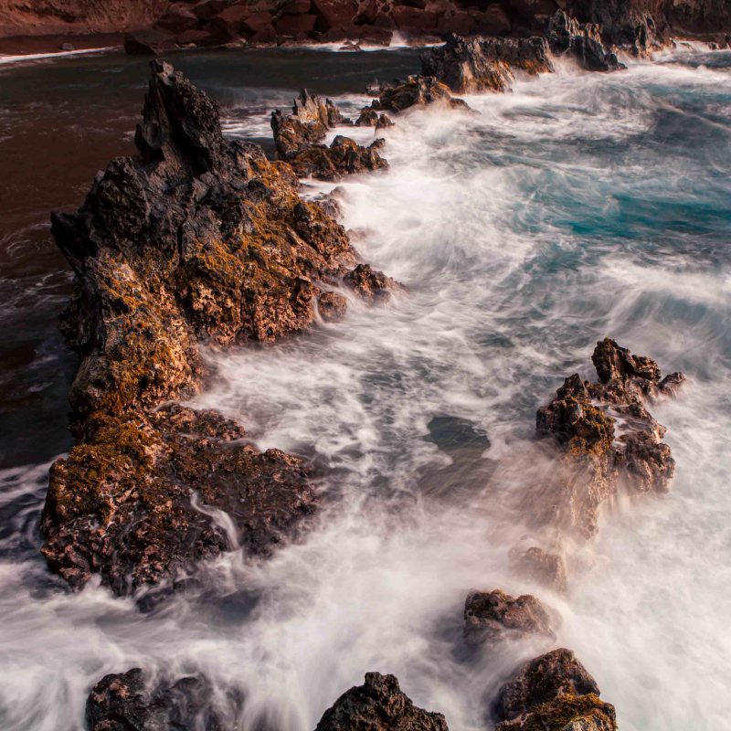 Red Sand Beach hana town turquoise ocean red rock
