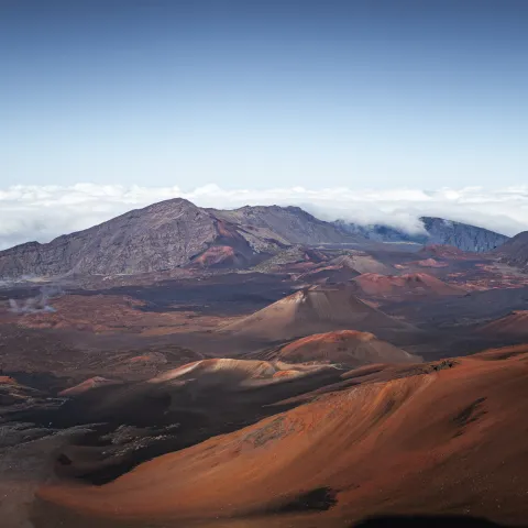Haleakala Crater red lava sand above the clouds volcano